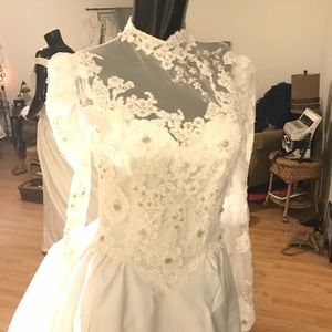 Lace long sleeve wedding gown with train